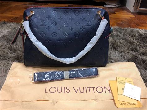 louis vuitton cuir glace handbag price|louis vuitton handbag with lock.